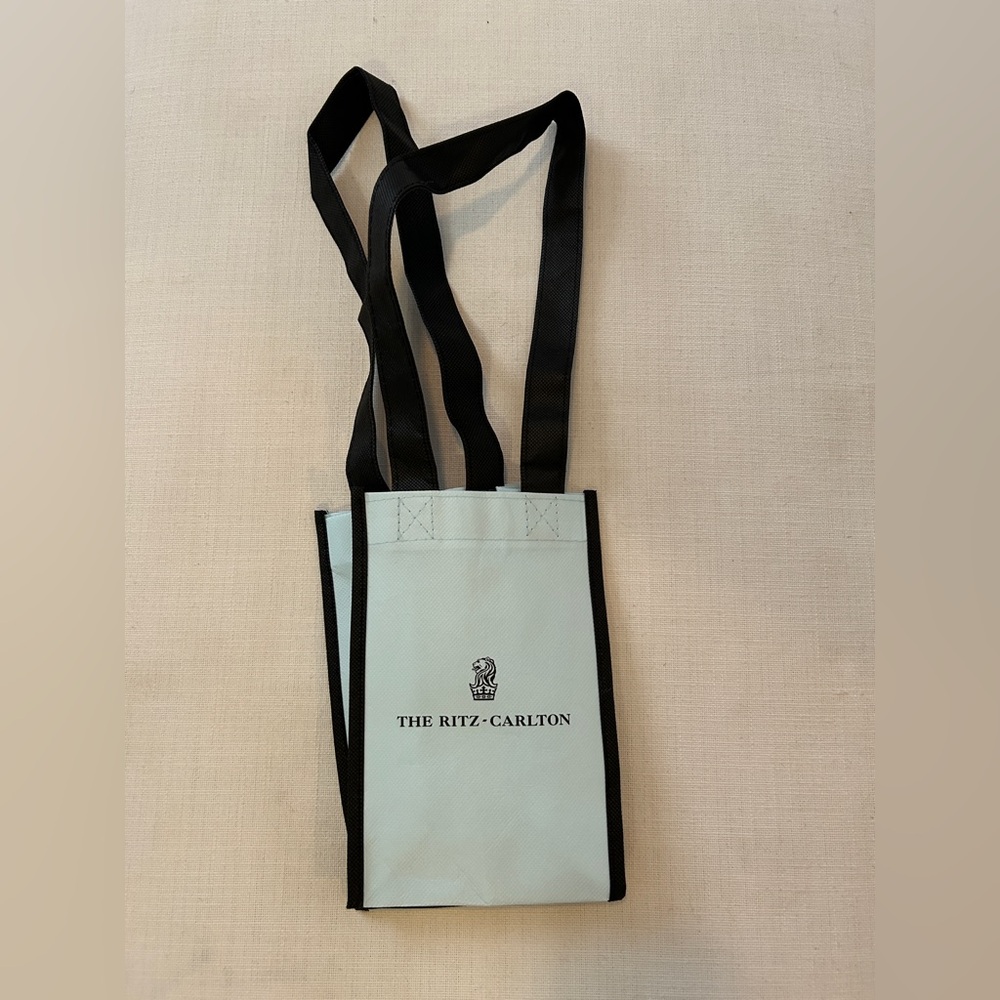 The Ritz-Carlton Black and Light Blue Toiletry Bag